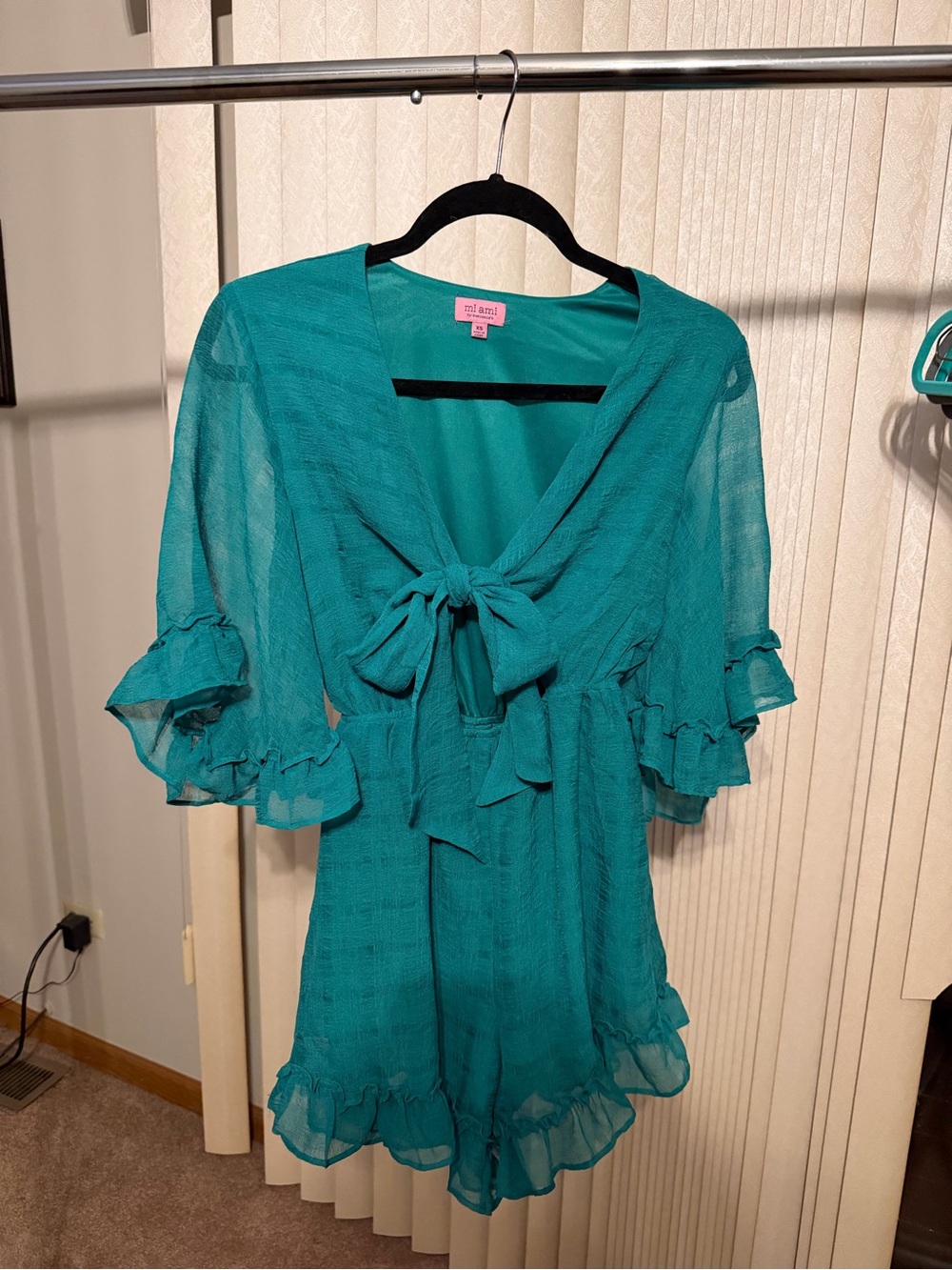 Mi ami for Francesca’s Teal Romper with Ruffle Sleeves